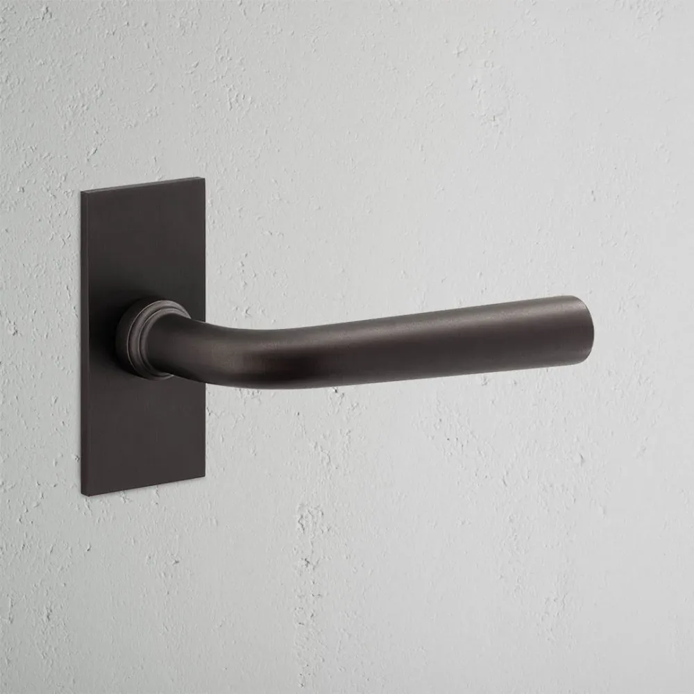 Apsley Short Plate Sprung Door Handle - Copper-brown