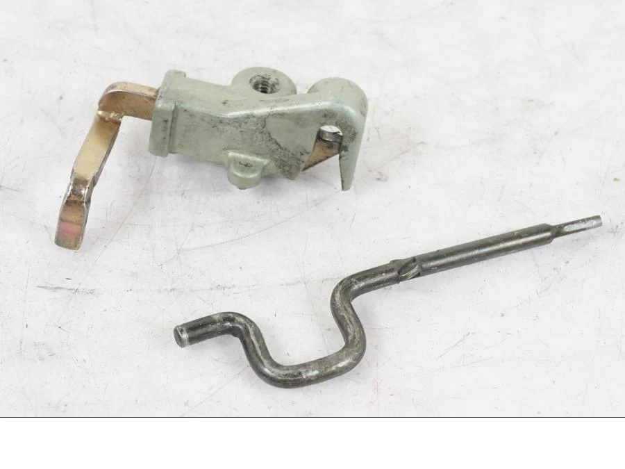 Mechanismus zámku sedla Honda