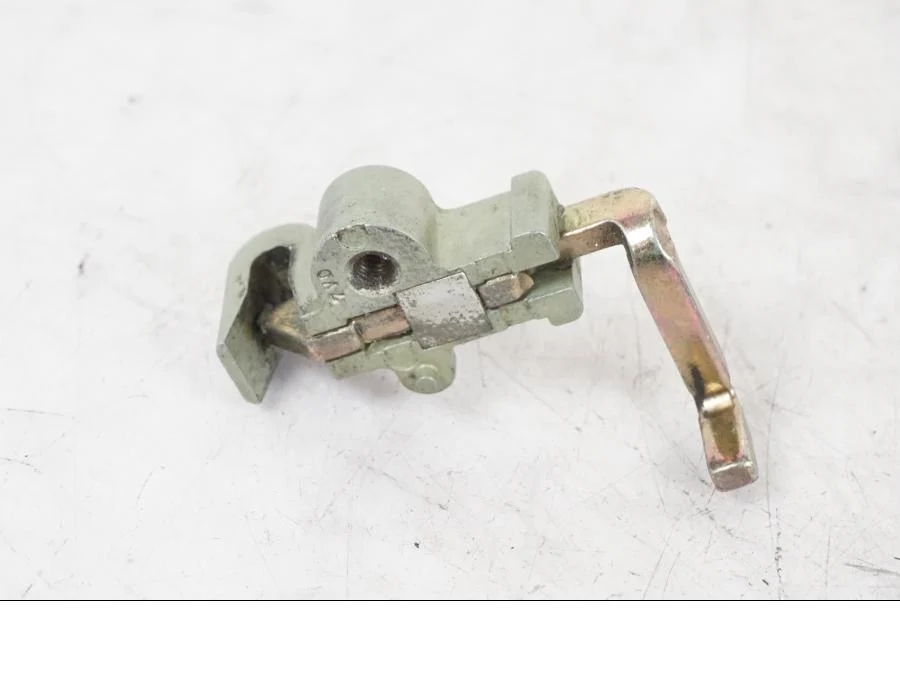 Mechanismus zámku sedla Honda