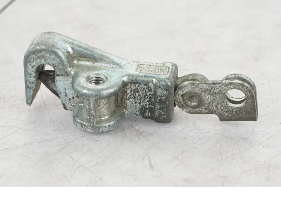Mechanismus zámku sedla Triumph