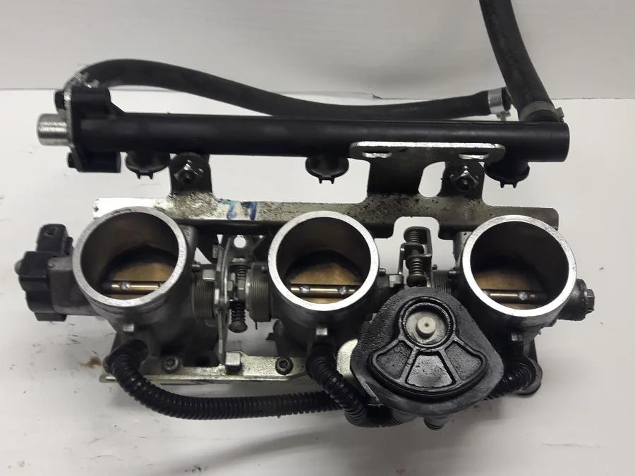 Těleso škrticí klapky Triumph
