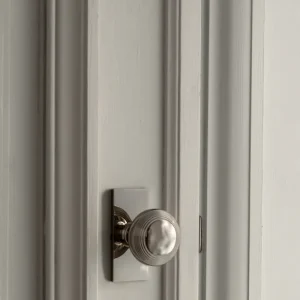 Privacy Lock Poplar Short Plate Sprung Door Knob - Polished Nickel
