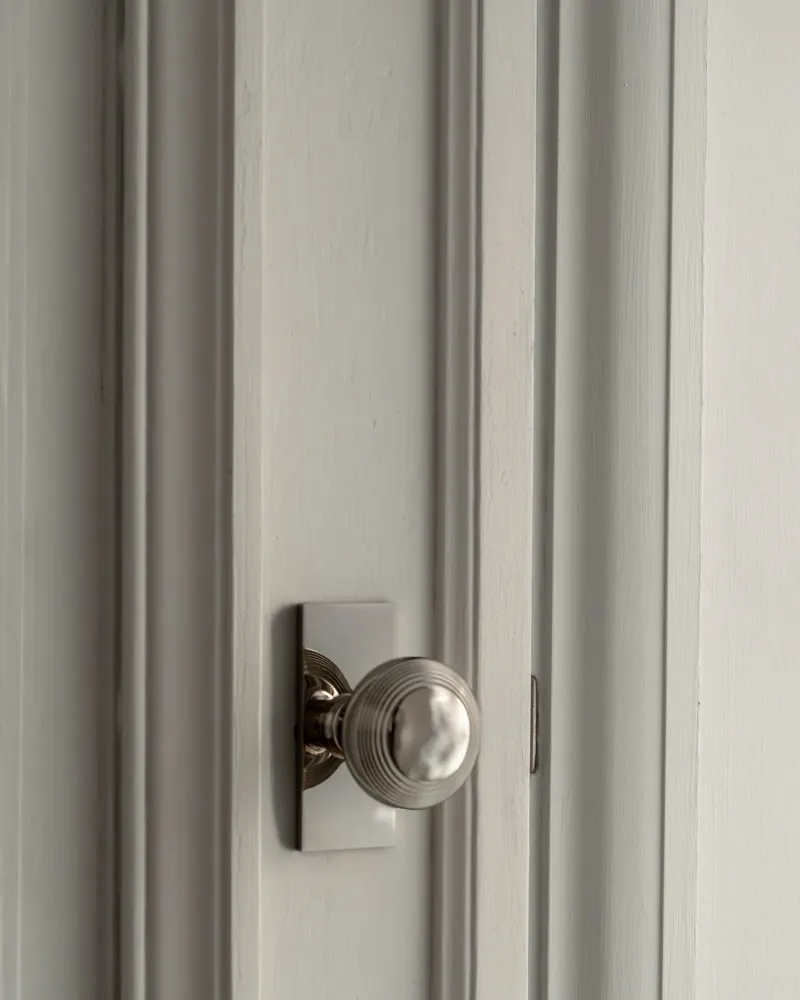 Privacy Lock Poplar Short Plate Sprung Door Knob - Polished Nickel