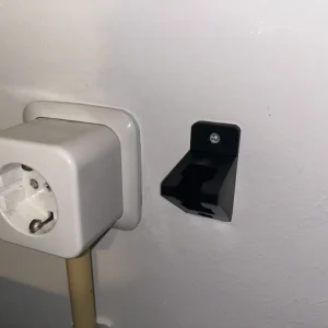 Všestranný Wall-fixed držák elektrického kabelu Orange